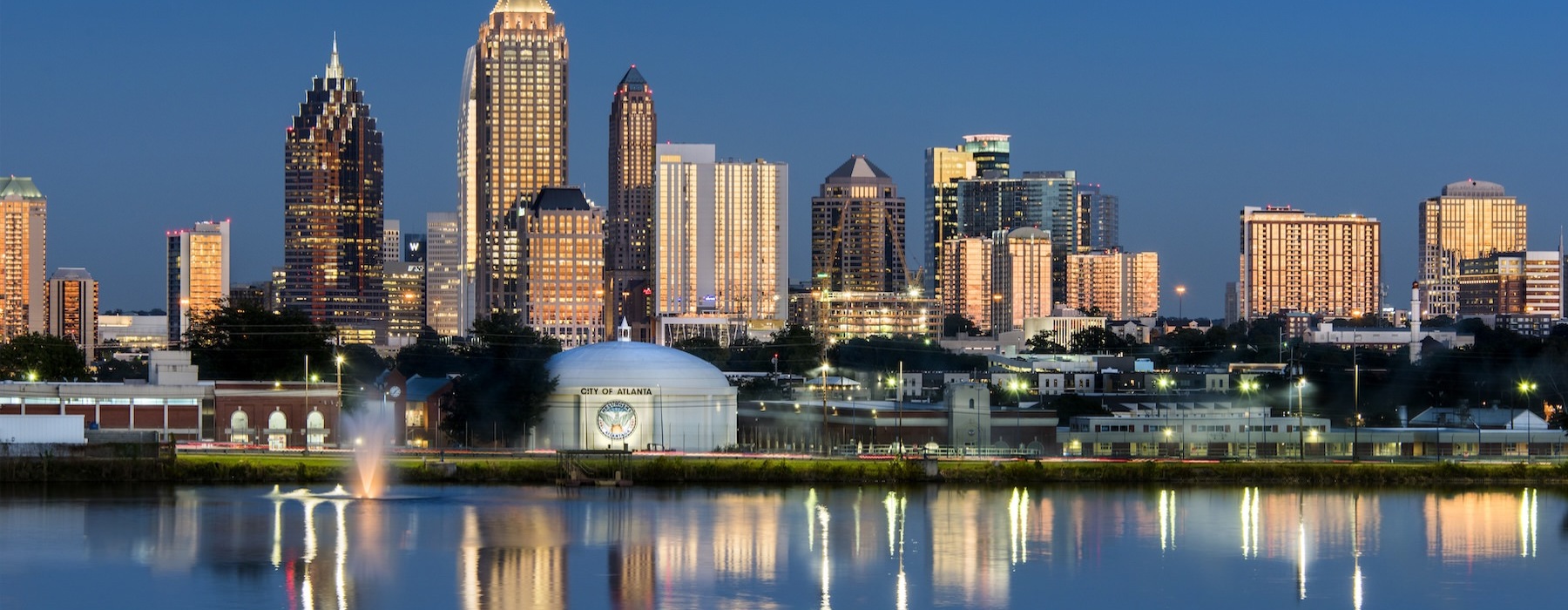 a city skyline at dusk